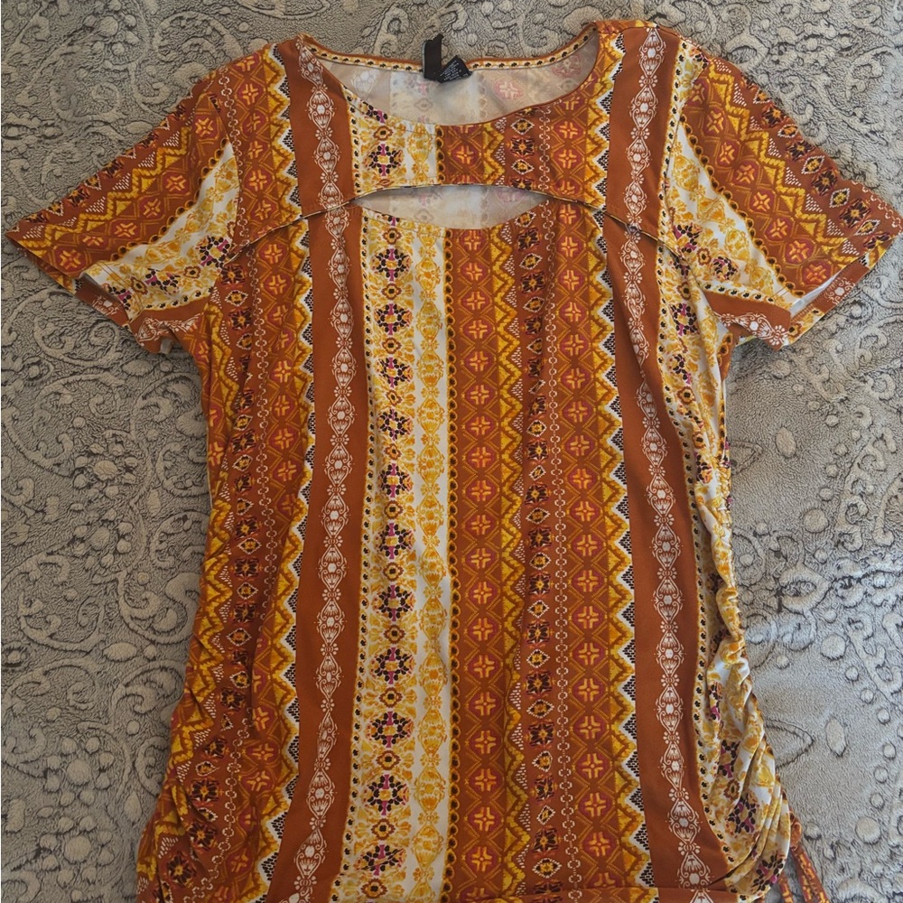 orange and yellow boho top with cut out detail and scrunched tie sides. Size L